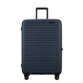 75cm Restackd Spinner Suitcase by Samsonite in midnight blue, featuring wheels and a sleek design for travel convenience.