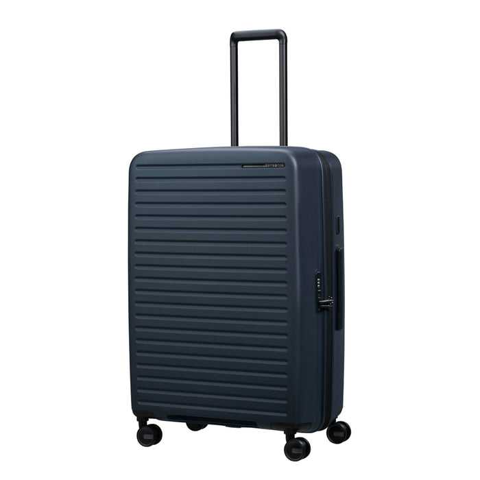 75cm Restackd spinner suitcase by Samsonite in midnight blue, showcasing four wheels and a telescopic handle.