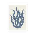 A framed art print of abstract indigo blue seaweed against a white background, displayed in a simple black frame.