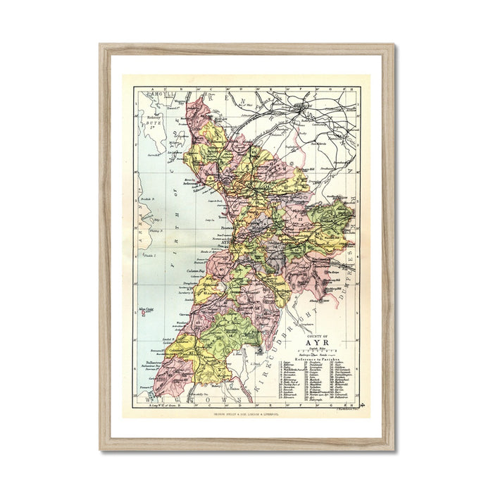 A framed vintage map print of Ayrshire, Scotland, with a wooden frame.