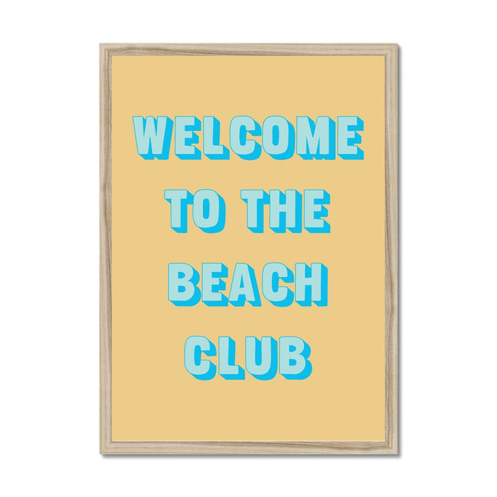 Framed coastal typography print with 'Welcome to the Beach Club' text on a yellow background