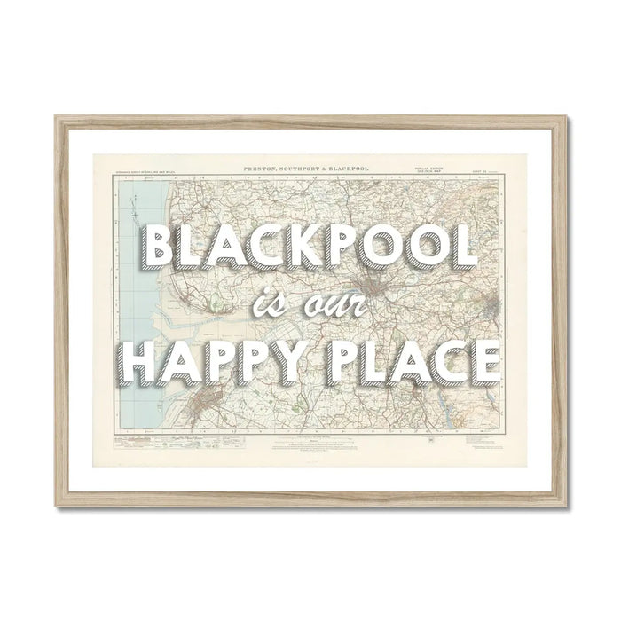 Framed Blackpool map print with the text 'BLACKPOOL is our HAPPY PLACE' overlayed on a map background, within a simple wooden frame.