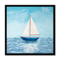 Framed artwork of a sailboat on water with a blue sky.