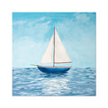 Sailboat on water with a blue sky background