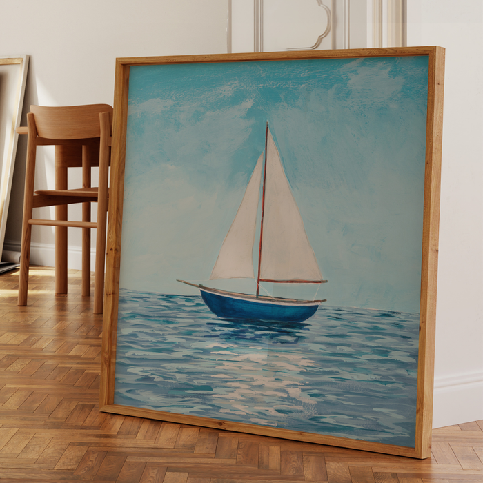 Framed painting of a sailboat on water in a room with wooden floor and chair.