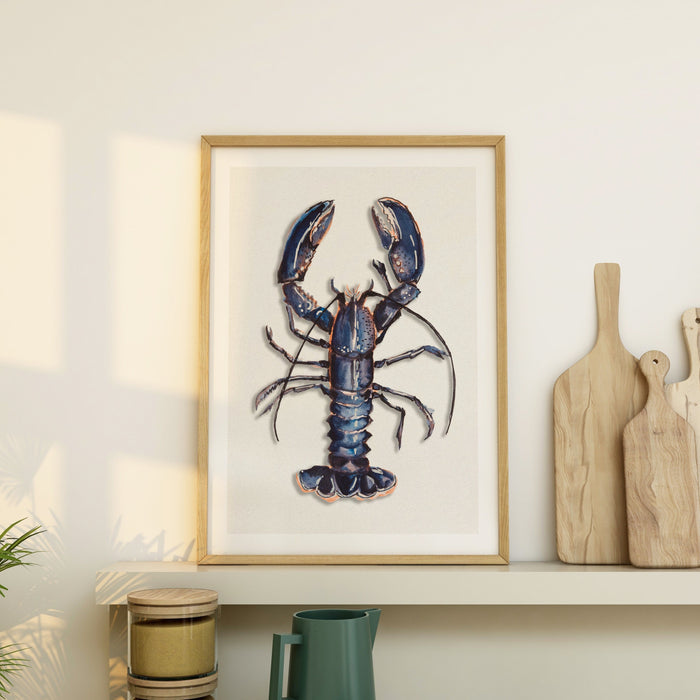 Blue lobster print styled in a coastal kitchen interior with wooden accents