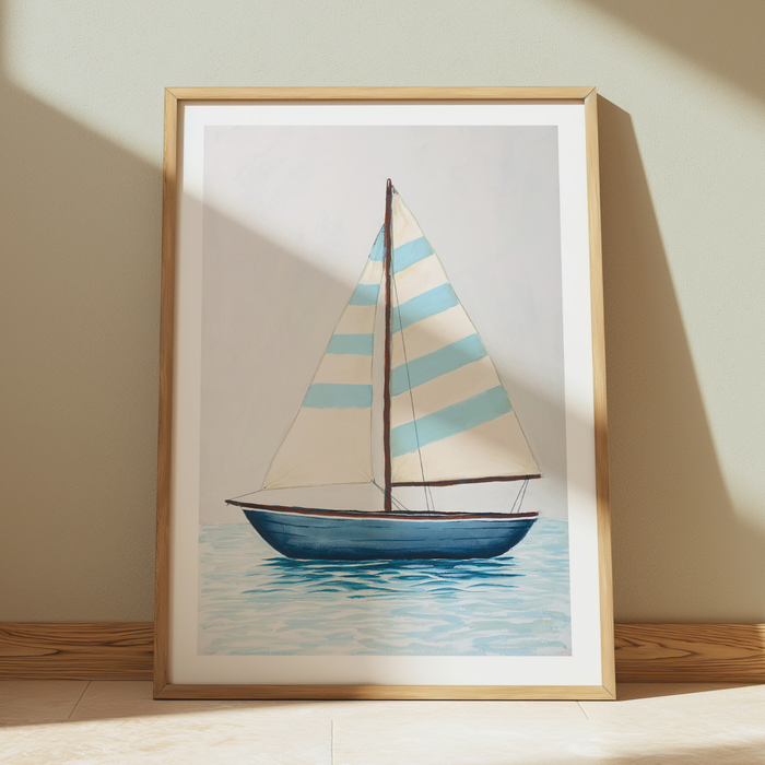 Framed artwork of a sailboat with striped sails on a light background