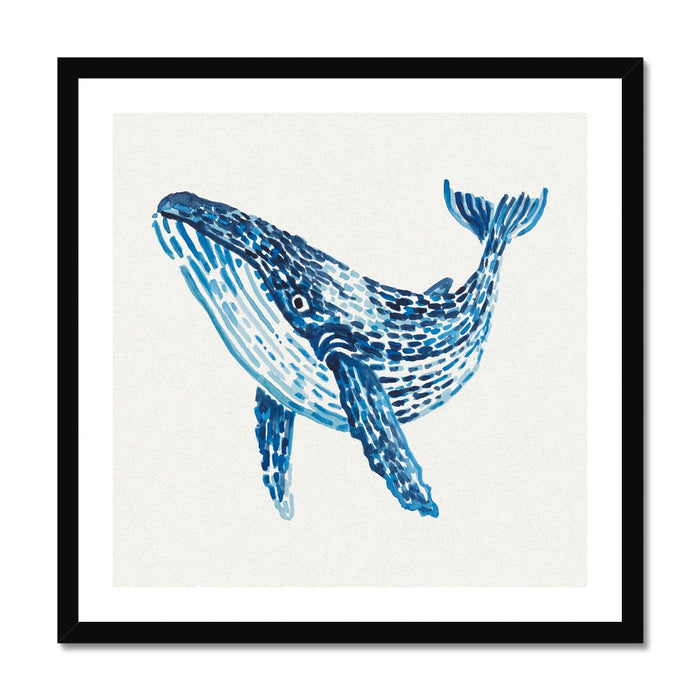 Framed artwork of a blue whale on a white background