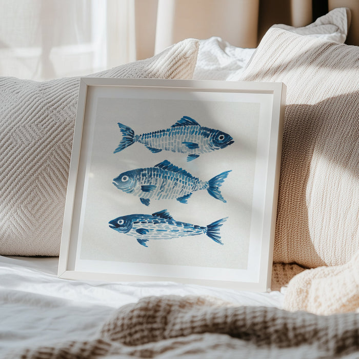Painting of three fish in blue watercolour on bed