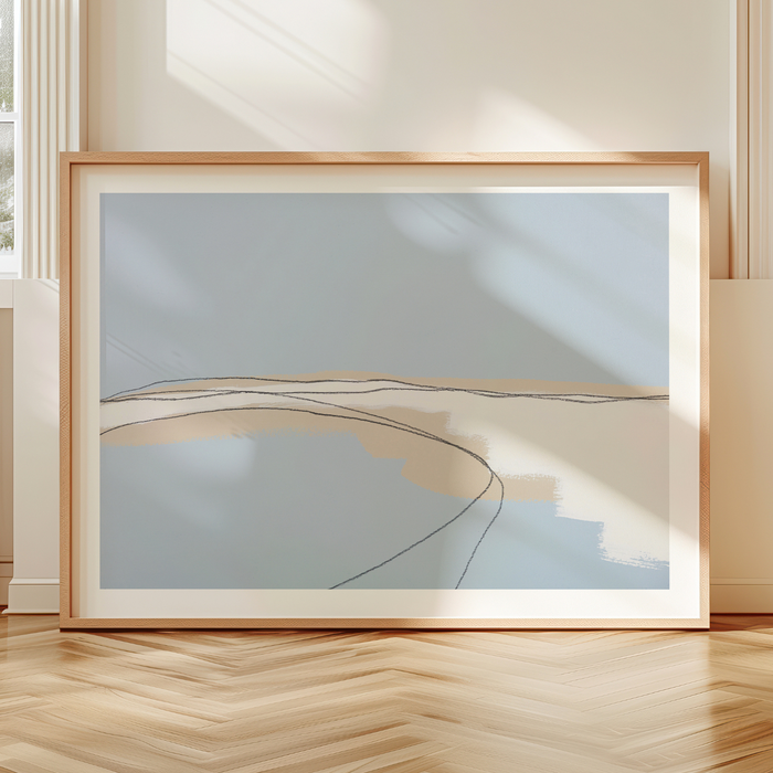 Framed abstract seascape wall art in muted blue and neutral tones