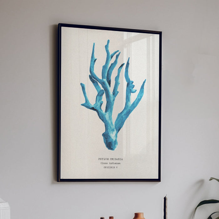 Set of three coral art prints - coral paintings as a set framed in natural frame above a bed.
