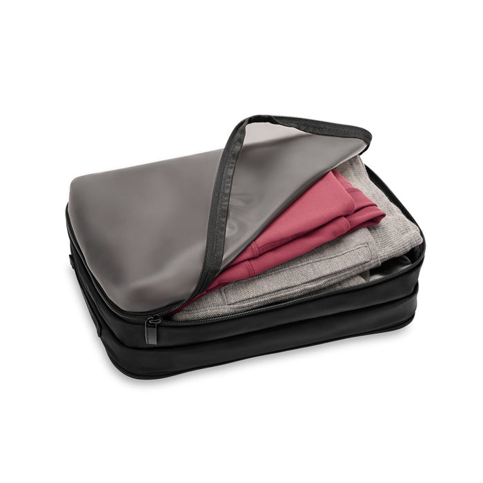 Briggs & Riley double-sided packing travel cube in black, showcasing organized compartments for efficient packing.