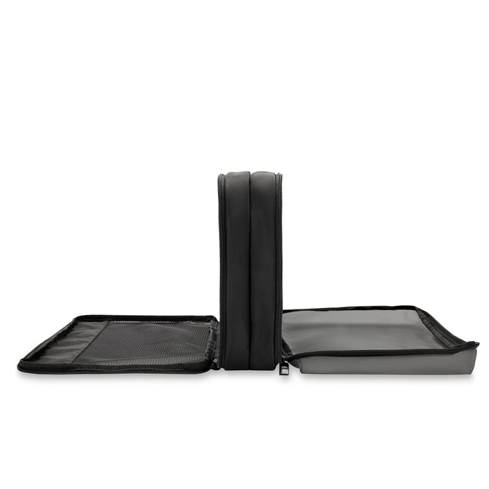Briggs & Riley double-sided packing travel cube in black, showcasing compartments for organized travel accessories.