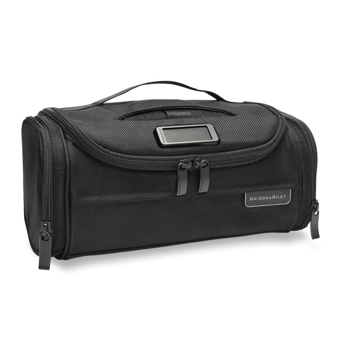 Briggs & Riley Luggage Executive Essentials Kit in black, featuring a compact washbag design for travel organization.