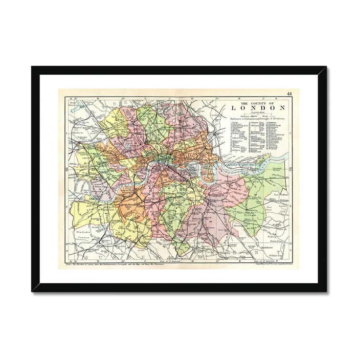 Framed vintage map print of London featuring a detailed, multi-coloured map enclosed in a black frame.