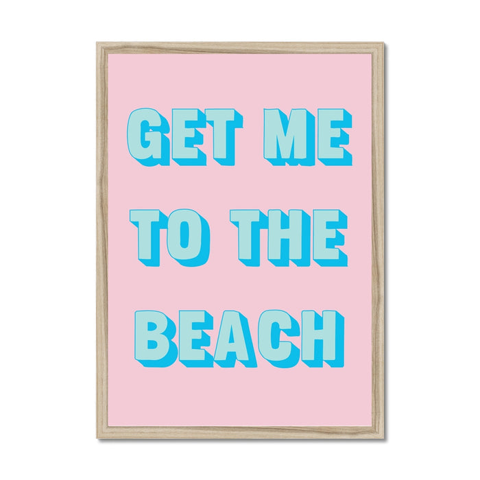 Framed coastal typography print with 'GET ME TO THE BEACH' text on a pink background