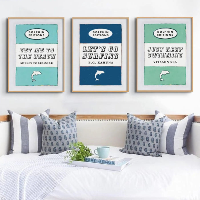framed print of a vintage book cover art titled "Get Me to the Beach" in aqua blue