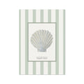 Framed illustration of a shell on a striped background