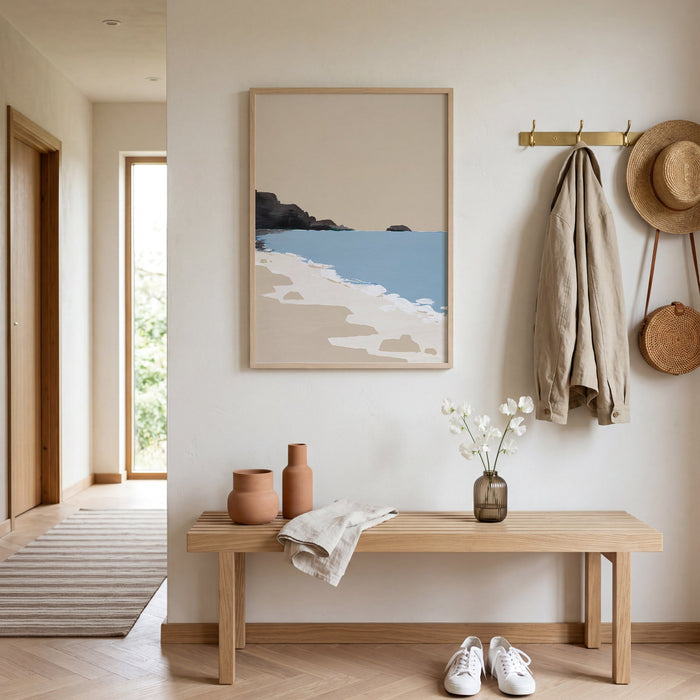 Modern interior with a wooden bench, coastal artwork, and shoes in a hallway.