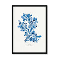 Framed blue seaweed wall art in a natural wood frame, with an indigo blue watercolour coastal botanical print.