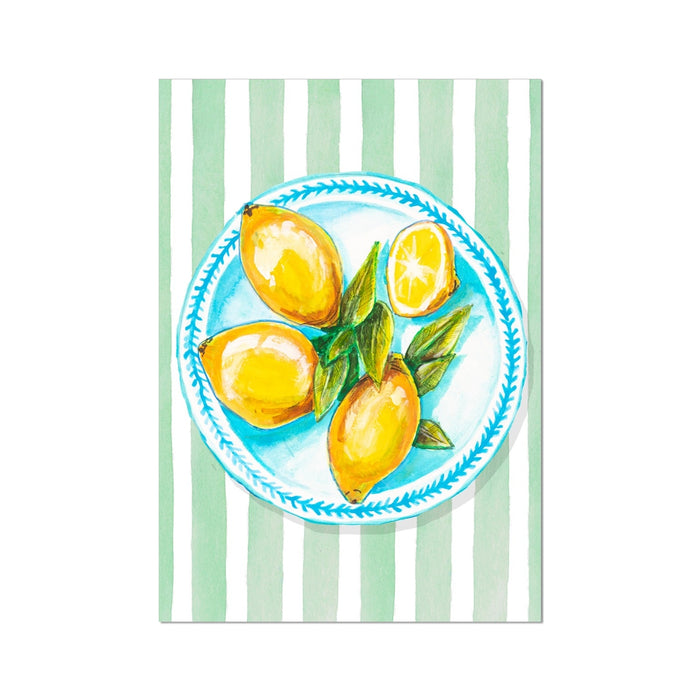 Hand-painted artwork of lemons on a plate with a green striped background.