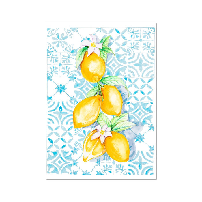 Decorative paper with watercolor lemons and floral design on a blue patterned background