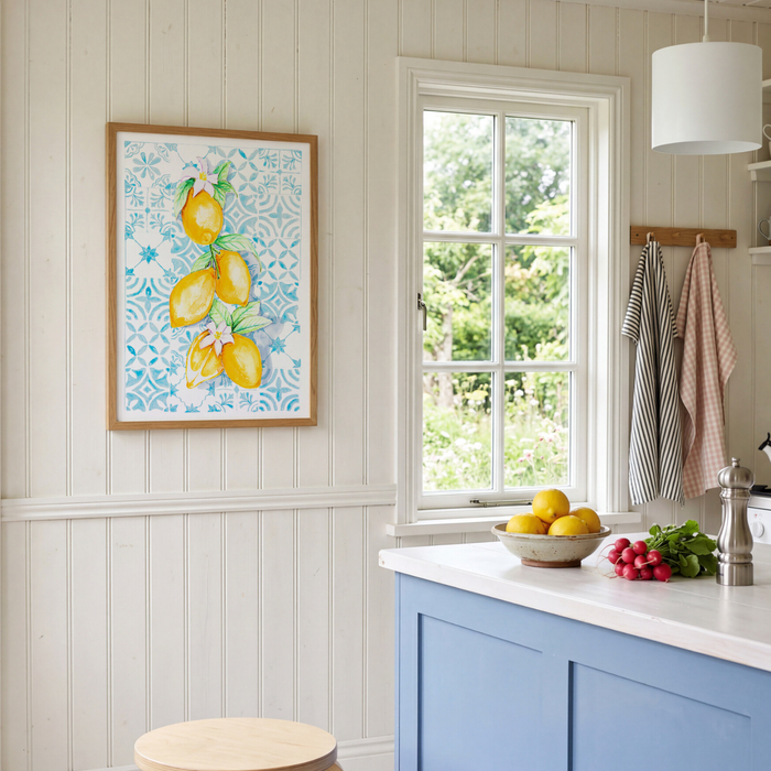 Kitchen interior with a painting of lemons on the wall, window, and countertop with fruits.