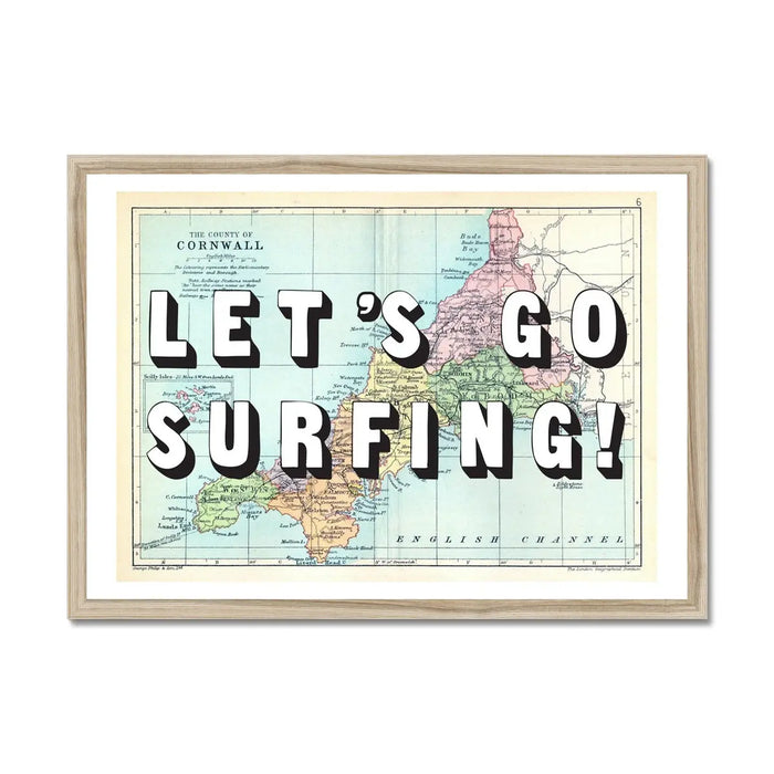 Framed art print featuring a vintage map of Cornwall with the phrase 'LET'S GO SURFING!' overlaid on top.
