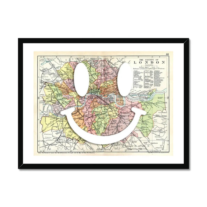 vintage map of London with a white smiley face on it in a black frame - beach house art