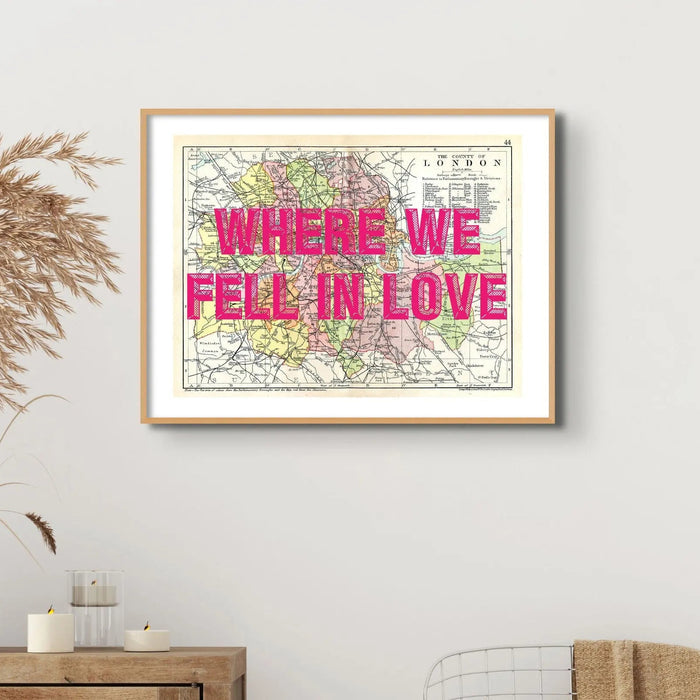 Coastal wall art featuring a personalised vintage city map print of London with navy font - Framed