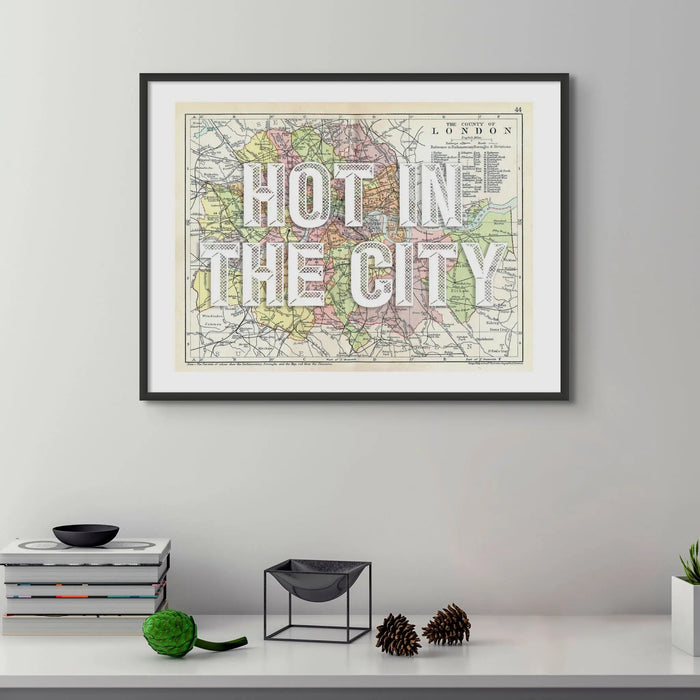 Coastal wall art featuring a personalised vintage city map print of London with white font  - Framed wall art