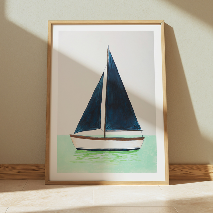 Framed artwork of a sailboat on a light background