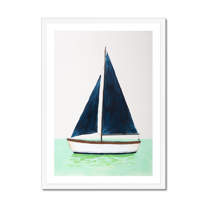 Framed artwork of a sailboat with blue sails on a light green background