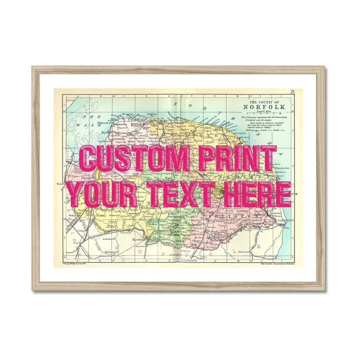 A framed personalised Norfolk map print with a pink typographic custom text overlay.