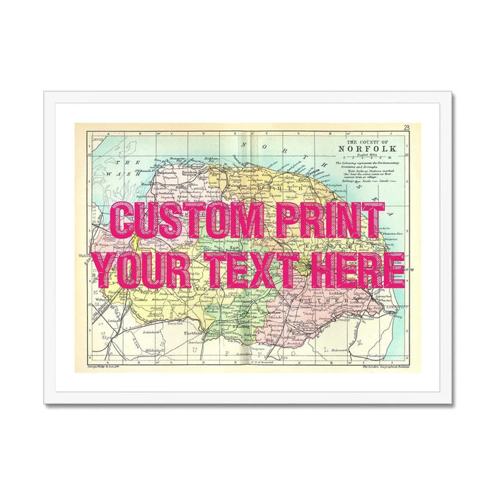 A framed personalised Norfolk map print with a pink typographic custom text overlay in a white frame.