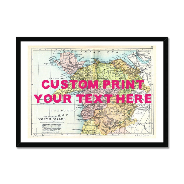Framed vintage map print of North Wales with a custom text area marked for personalisation, displayed on a map background.