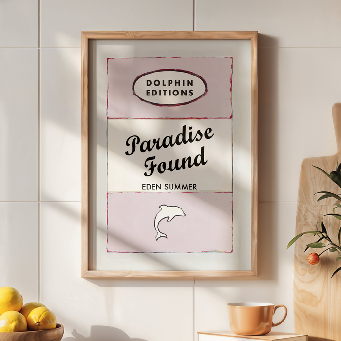 Quote print on book cover in kitchen. vintage style book cover art print with a quote in pink. A vintage-style book cover art print with the title 'Paradise Found' by Eden Summer, featuring pink and white colours with typographic elements.