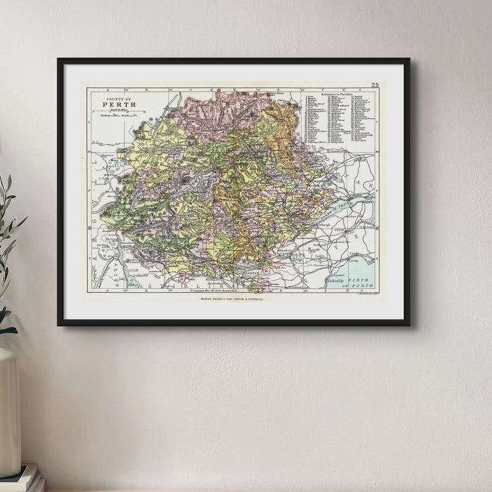 Framed vintage map print of Perthshire, Scotland in living room.