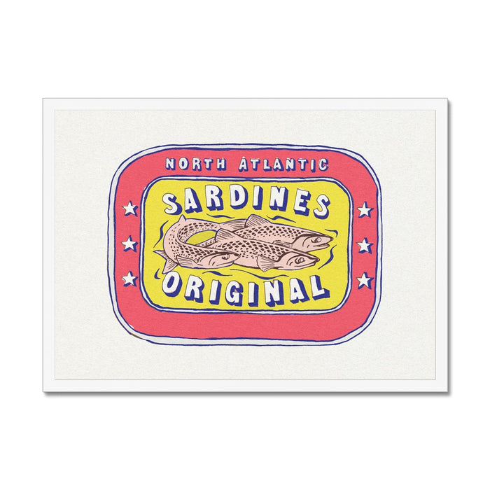 Framed artwork of a vintage sardine tin label with red and yellow colors featuring an illustration of a fish and the text 'SARDINES ORIGINAL'.
