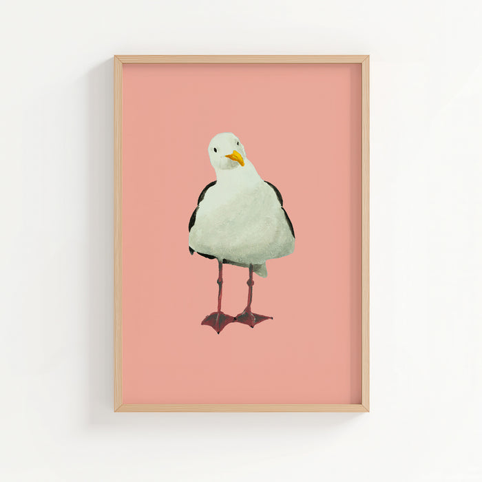 Framed artwork of a seagull on a pink background