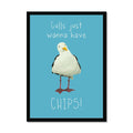 Seagull art print featuring a painted seagull on a blue background with the quote “Gulls just wanna have chips”, framed in a black wood frame.