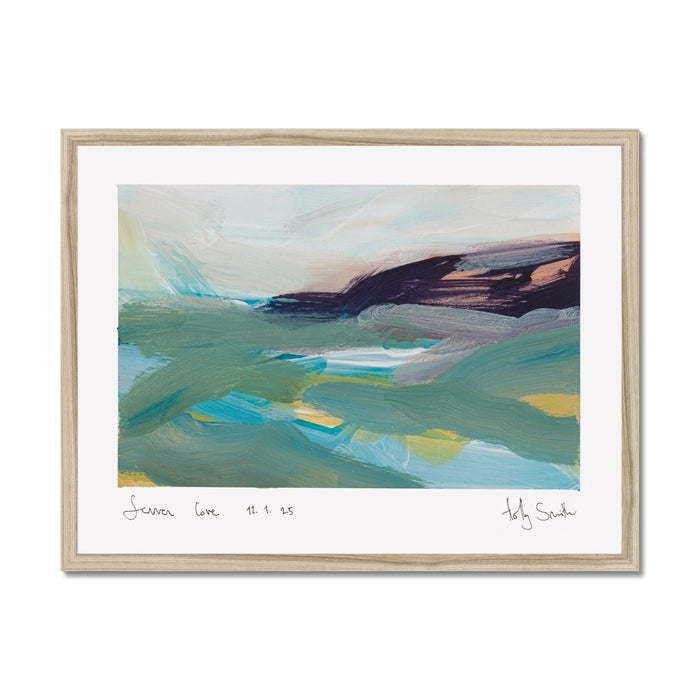 A framed abstract landscape painting featuring textured brushstrokes of teal, green, blue, yellow, and dark purple, presented in a light natural wood frame with a white mat and signature details at the bottom.