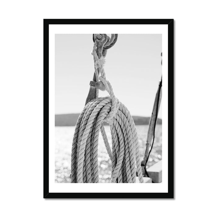 Black and white photograph of rope and tackle in a sailing context, framed print, simple design, high-quality wood frame, satin finish, fine art paper with textured surface.