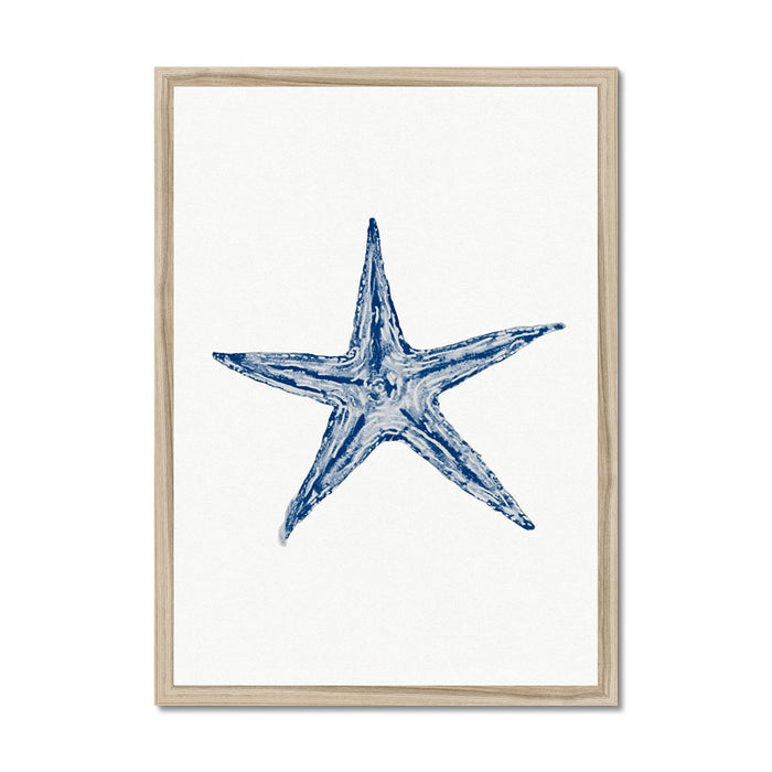 Framed watercolour art print of a blue starfish on a white background, housed in a simple wooden frame.