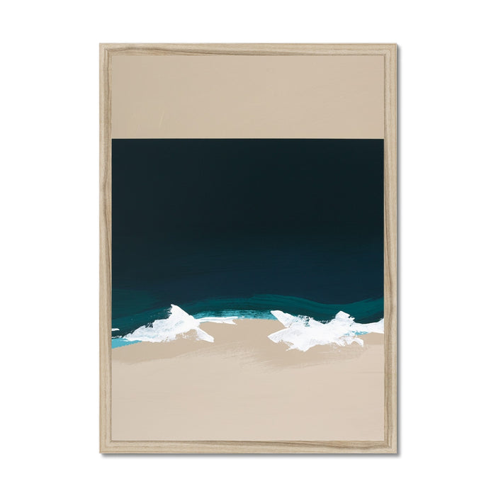 Framed artwork of a beach scene with dark blue water and beige sand.