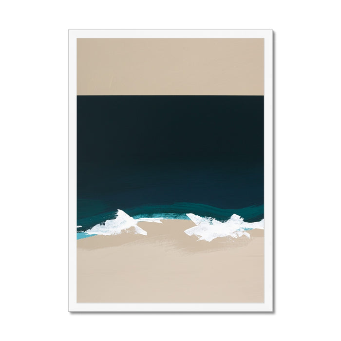 Framed artwork of a beach scene with blue water and beige sand.