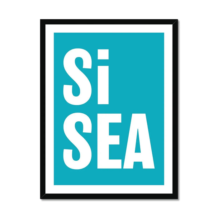 A framed typography art print with the words 'Si Sea' in large white letters on a teal background, framed in a simple black frame.