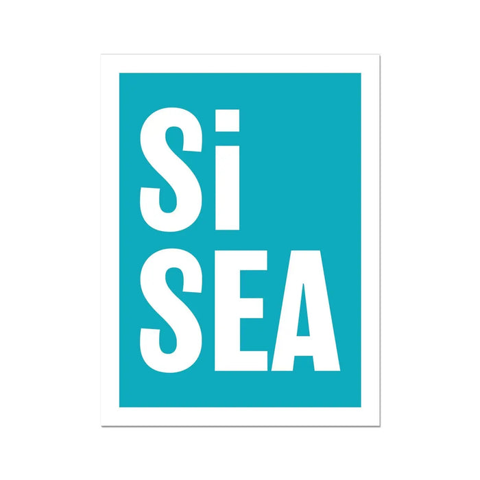 A framed typography art print with the words 'Si Sea' in large white letters on a teal background.