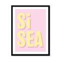 A framed word art print with the text 'Si Sea' in yellow letters on a pink background