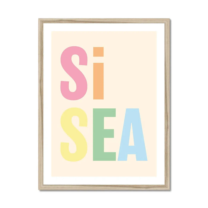 A framed word art print with the text 'Si Sea' in multicoloured letters against a pale background.